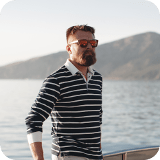 Man wearing sunglasses and striped shirt